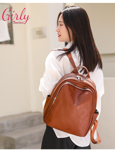 شنطة ظهر جلد بحروف محفورة - Girly