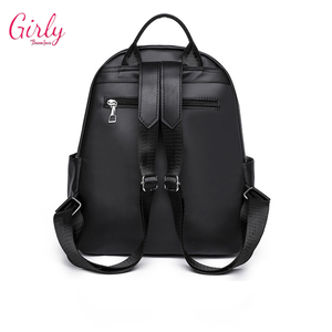 شنطة ظهر جلد بحروف محفورة - Girly