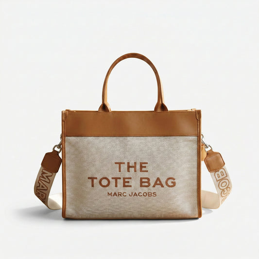 The Iconic Canvas Tote Bag | شنطة توت كانفاس بتفاصيل جلد