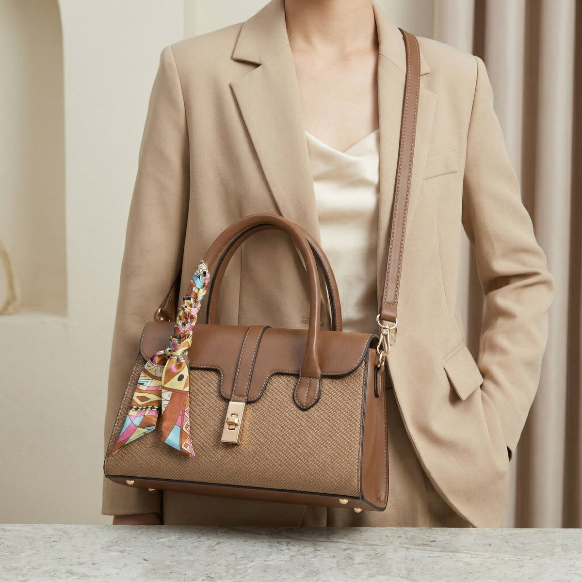 شنطة كلاسيك بتفاصيل فاخرة – with a Chic Scarf Touch