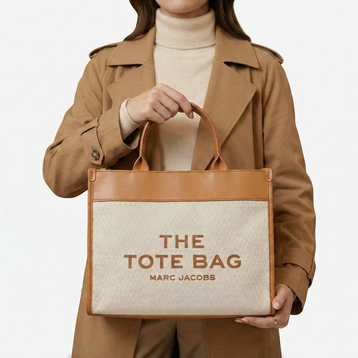The Iconic Canvas Tote Bag | شنطة توت كانفاس بتفاصيل جلد