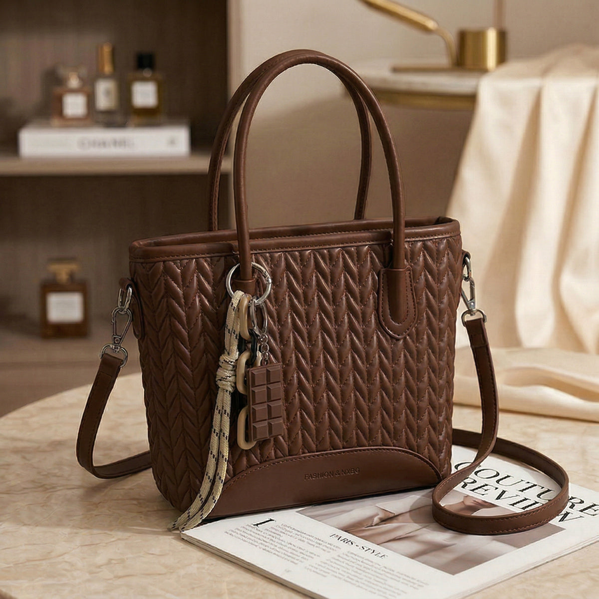 شنطة جلد مجدول بميدالية شوكولاتة-Leather Bag with Chocolate Charm