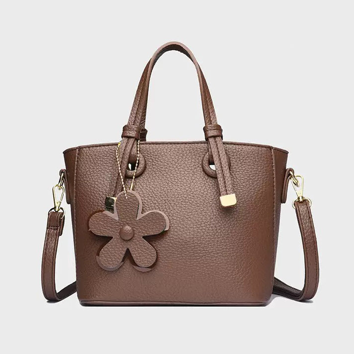 Chic Floral Charm Handbag – شنطة شيك بلمسة أنثوية