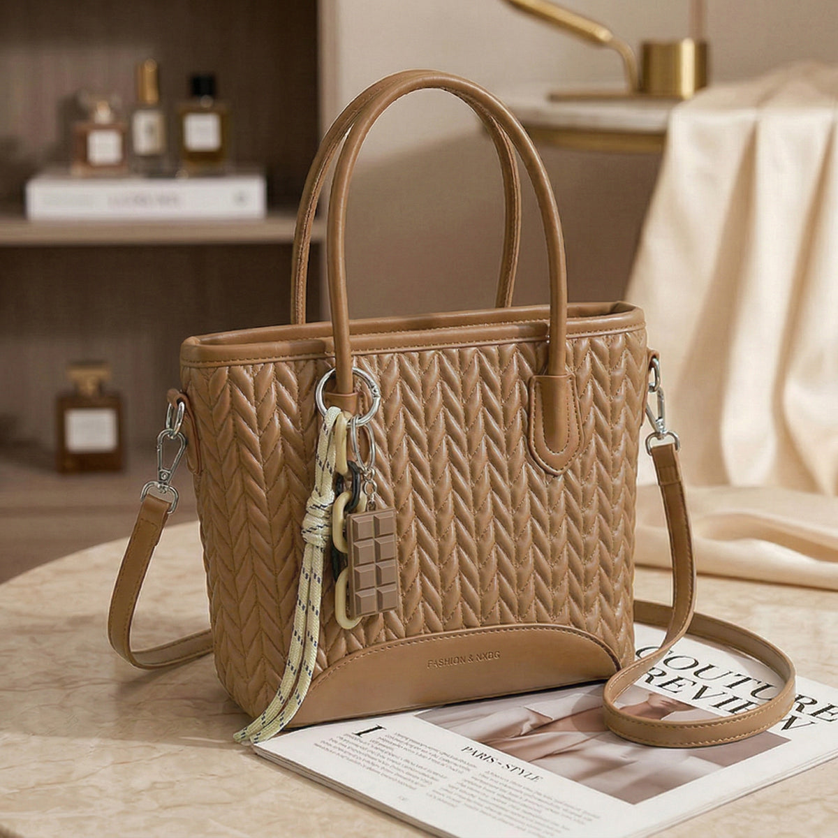 شنطة جلد مجدول بميدالية شوكولاتة-Leather Bag with Chocolate Charm