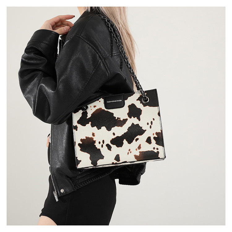 شنطة مستوردة جلد بنقشة Animal Print