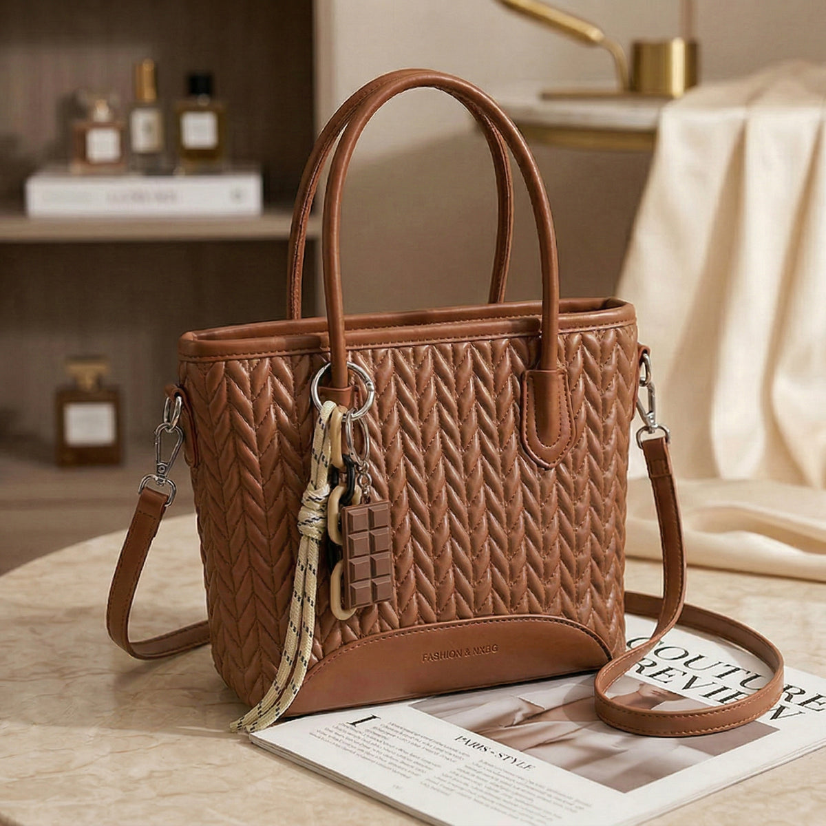 شنطة جلد مجدول بميدالية شوكولاتة-Leather Bag with Chocolate Charm