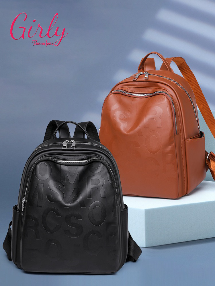 شنطة ظهر جلد بحروف محفورة - Girly