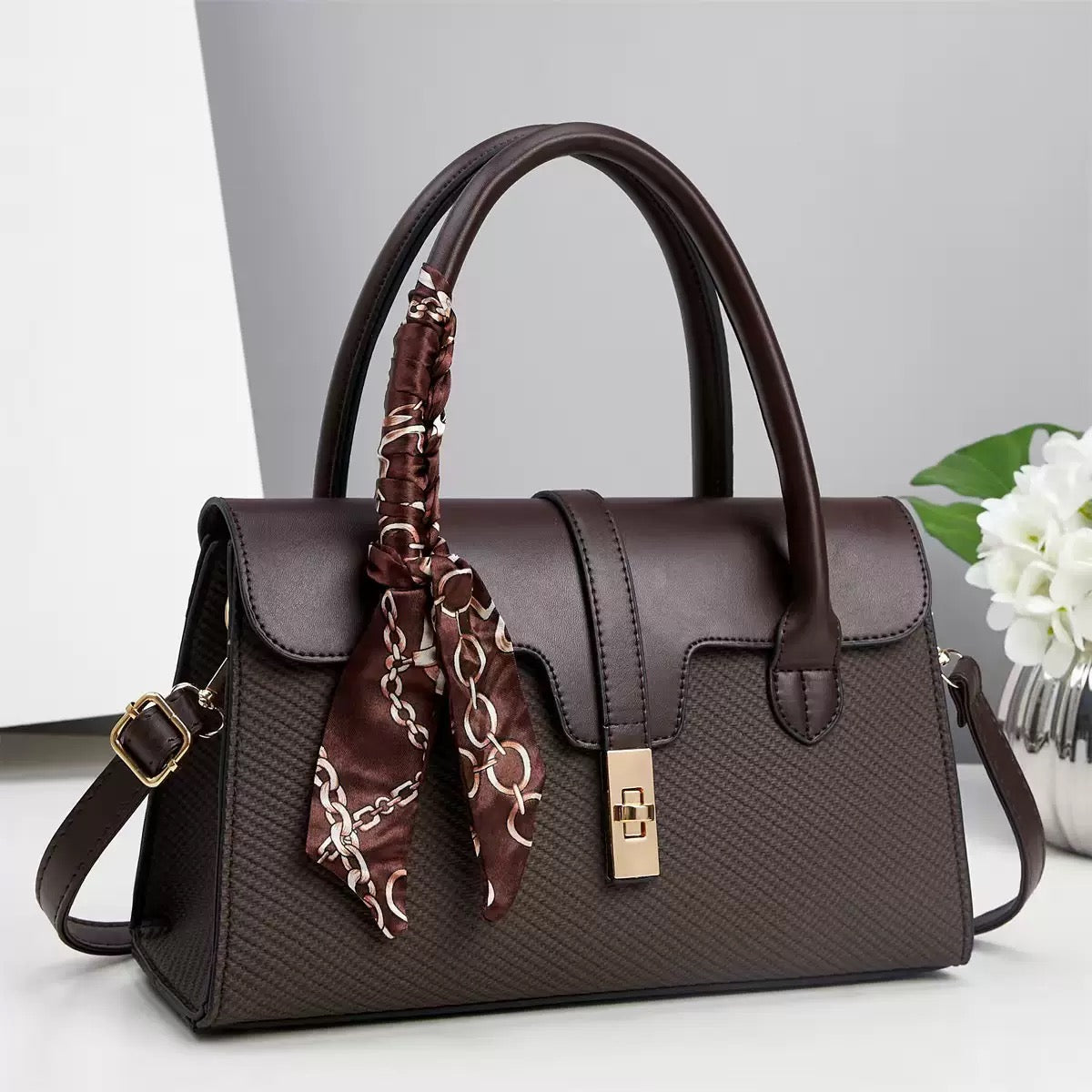 شنطة كلاسيك بتفاصيل فاخرة – with a Chic Scarf Touch