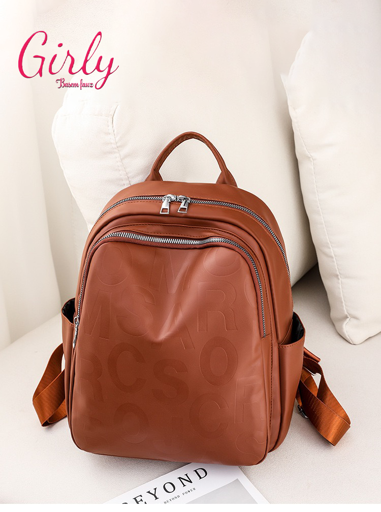 شنطة ظهر جلد بحروف محفورة - Girly