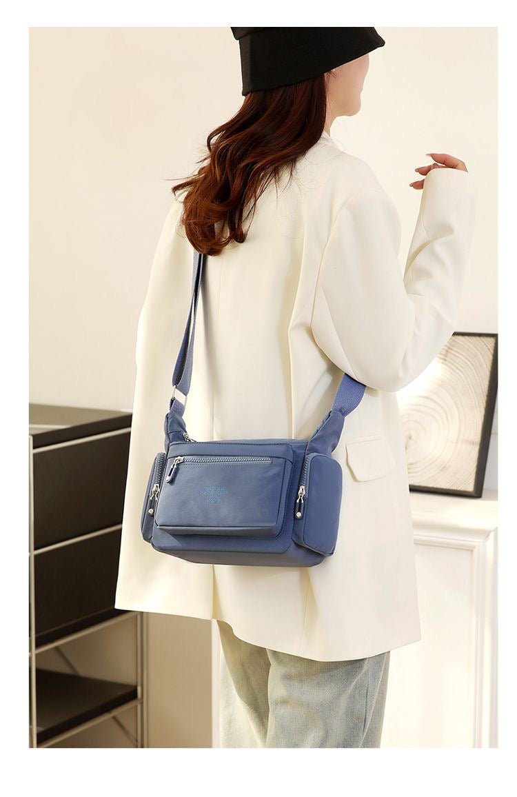 شنطة كروس بتنظيم مثالي وجيوب متعددة - Organized Crossbody Bag