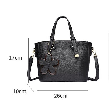 Chic Floral Charm Handbag – شنطة شيك بلمسة أنثوية