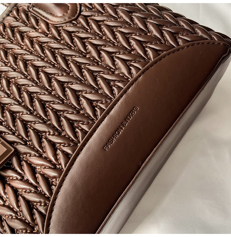 شنطة جلد مجدول بميدالية شوكولاتة-Leather Bag with Chocolate Charm